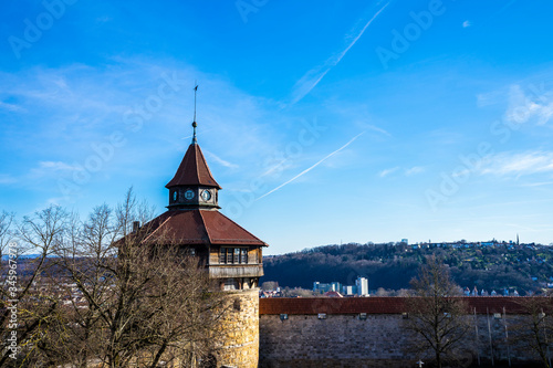 Germany, Esslingen am Neckar, beautiful medieval castle tower and castle wall of the old town with blue sky in springtime