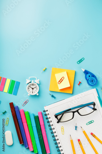 Stationery for school and creativity are on a blue background.