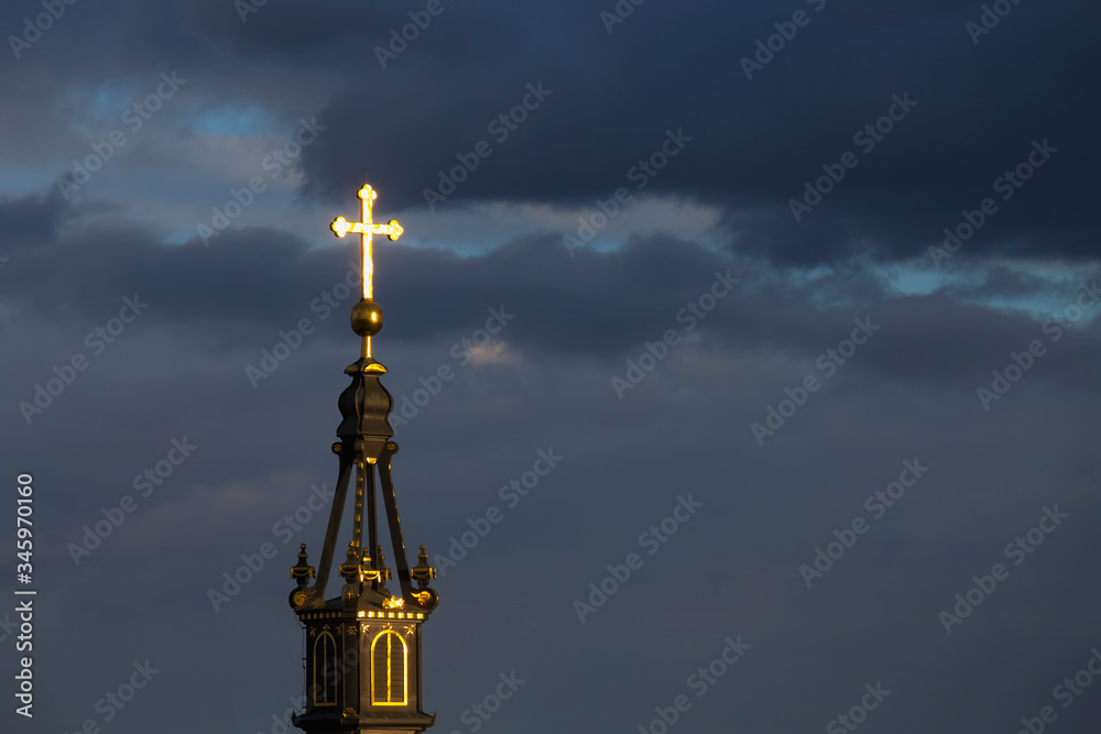 Golden cross on bell tower of Saint Nicholas church in Zemun,Serbia