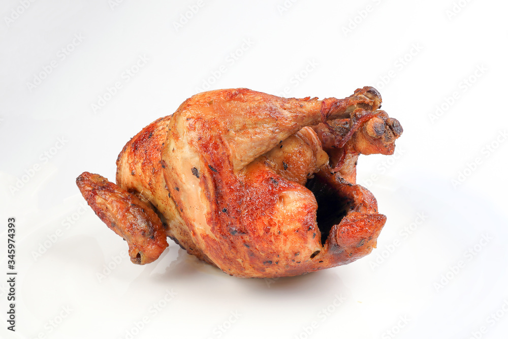 Whole roasted grilled chicken poultry bird on white background Whole roasted grilled chicken poultry bird on white background