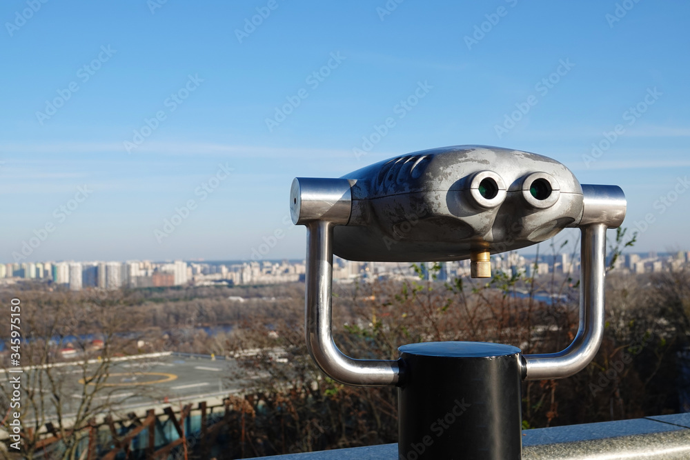 Paid viewing binoculars for tourists