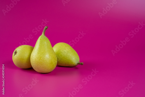 green pears on background