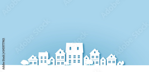 Paper cut houses on blue background city landscape village paper art digital craft style. vector illustartion
