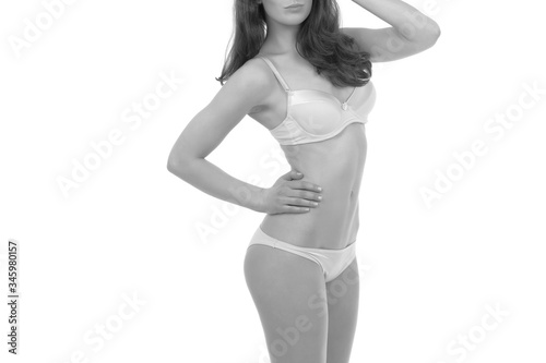 young girl with slender body posing in underwear