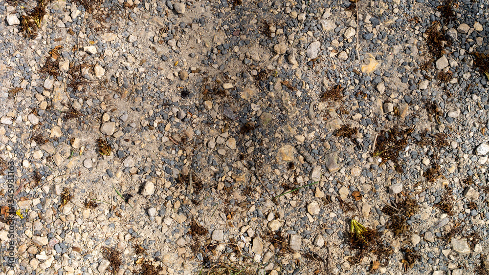 Close up of a natural walkway with pebbles, stones and loose dirt. Close up of a natural walkway with pebbles, stones and loose dirt.