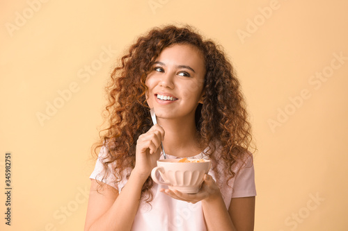 Smiling young woman with cu...