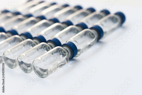 injection ampoules for vaccination on a white background, healthcare coronavirus, cancer, painand treatment, pharmaceutical medicine concept .