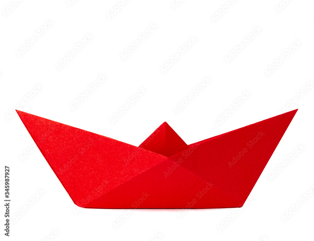 Origami red paper boat isolated on white background Origami red paper boat isolated on white background