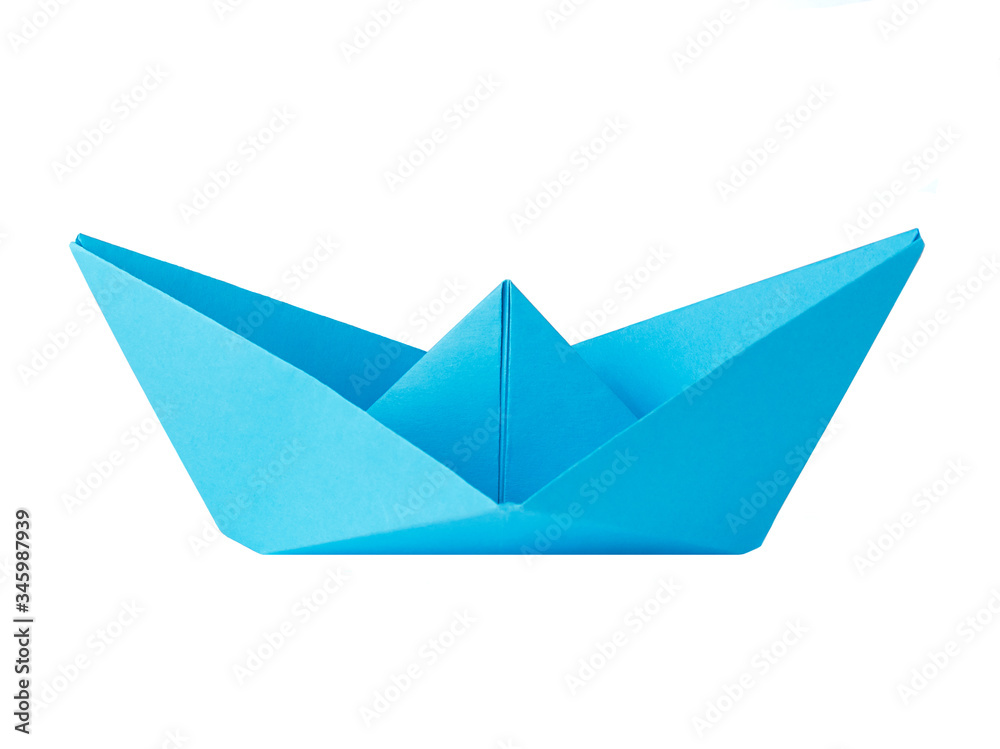 Origami blue paper boat isolated on white background Origami blue paper boat isolated on white background