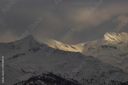 Misty mountain range in Bohinj region