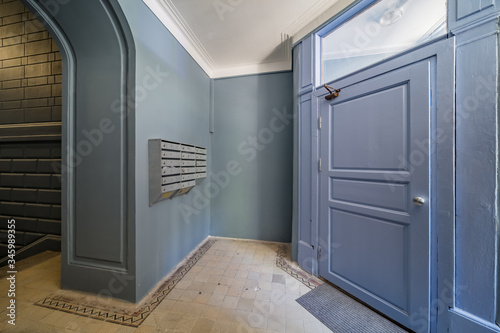 Doorway corridor in old apartment building entrance