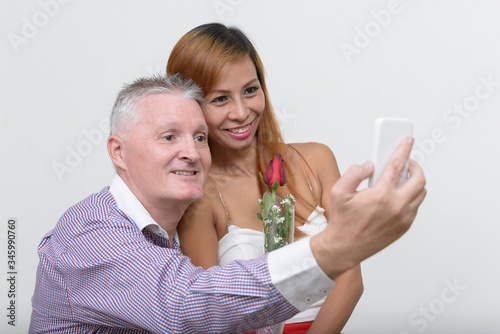Happy mature multi ethnic couple together and in love