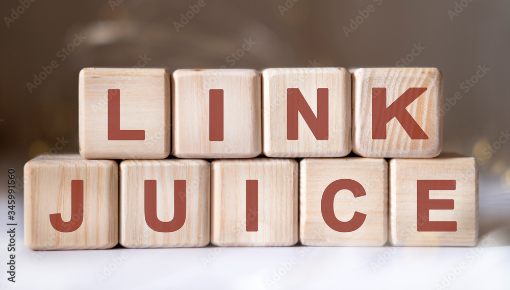 Link juice - concept on wooden cubes on a white table in the background Link juice - concept on wooden cubes on a white table in the background