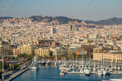 View of Barcelona city with Sail boats in Barcelona Harbour in the Fore ground, 