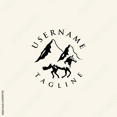 Logo of a horse farm in a vintage-style mountain area.