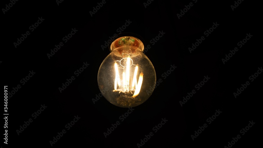 light bulb on black background light bulb on black background
