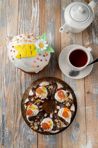 An assortment of orthodox easter cakes, traditional russian easter cakes on wooden table on wooden table, top view