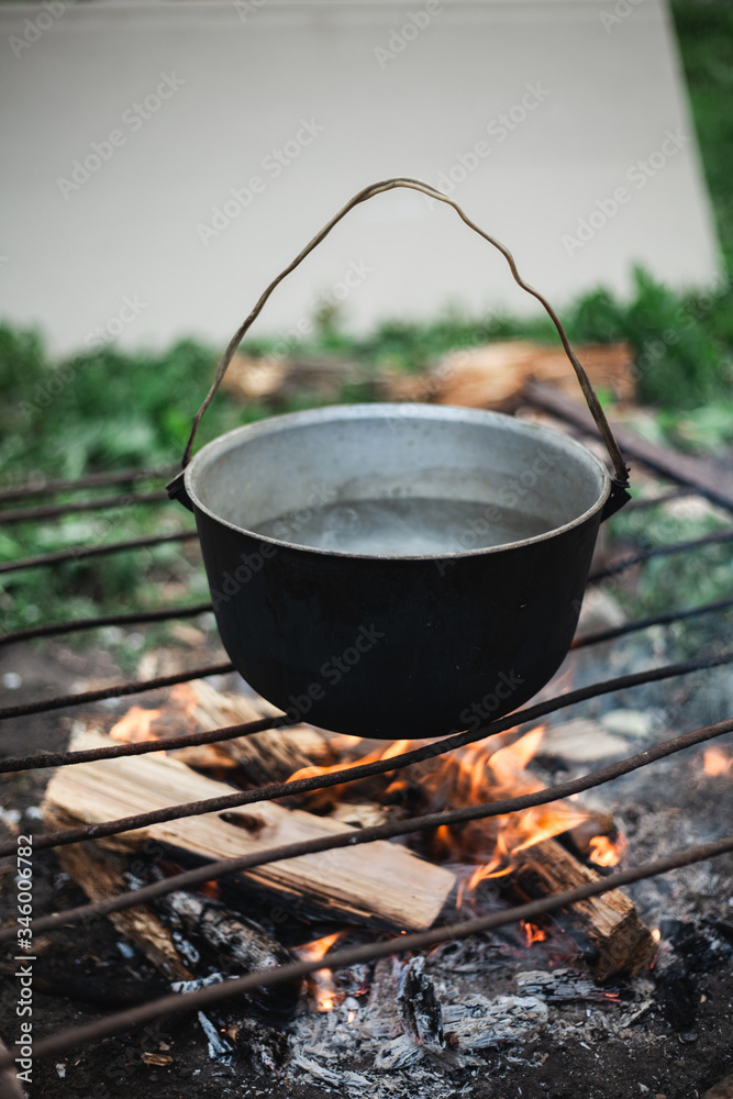 The process of cooking food. Cooking soup at the stake. The process of cooking food. Cooking soup at the stake.