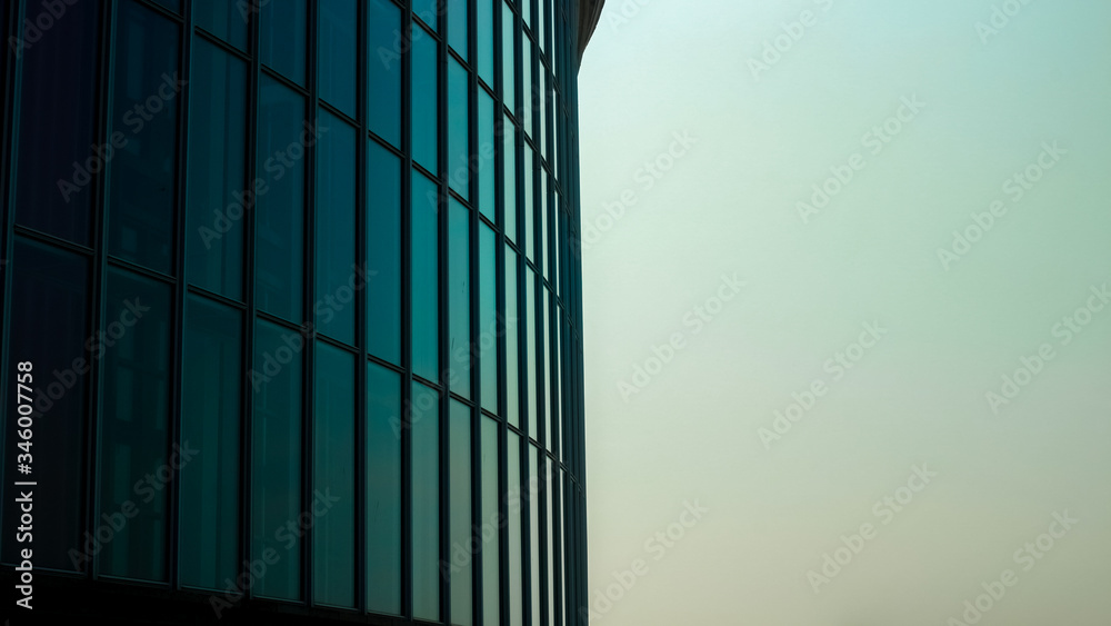 architectural glass windows pattern with a blue sky background architectural glass windows pattern with a blue sky background