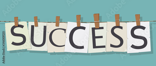 word Success attached to the rope with hairpins