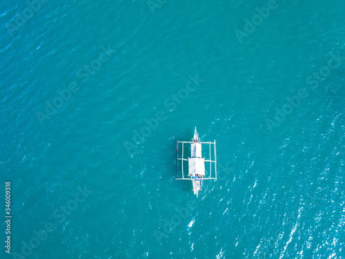 Aerial view of boat on the turquoise water