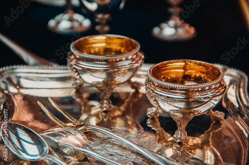 Fototapeta Naklejka Na Ścianę i Meble -  2 silver bowls. 2 glasses for wine.