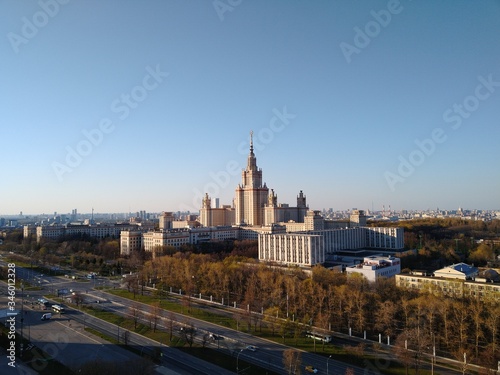  Moscow State University from a height on a sunny day in classical architecture against a bright blue sky in Moscow