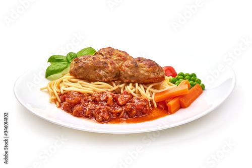 Homemade Baked Italian Meatballs with spaghetti and tomato sauce, isolated on white background