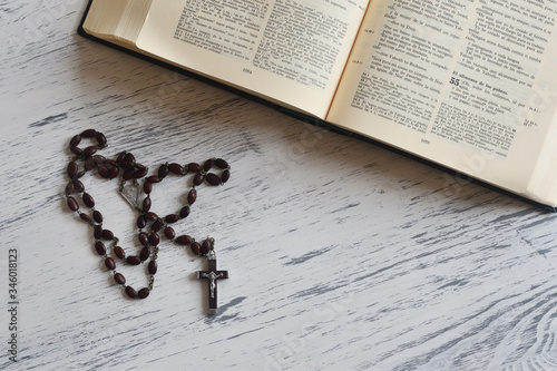 Rosary and a Bible