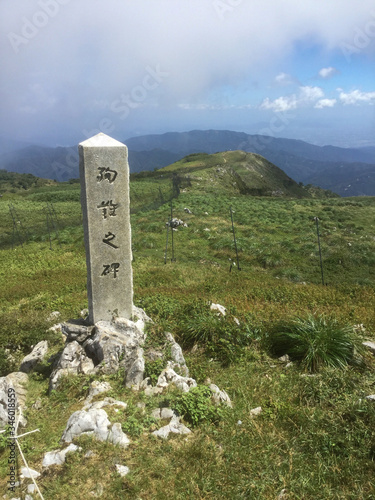 Landscape of Mount Ibuki with stone monument written as Marathon Monument фототапет