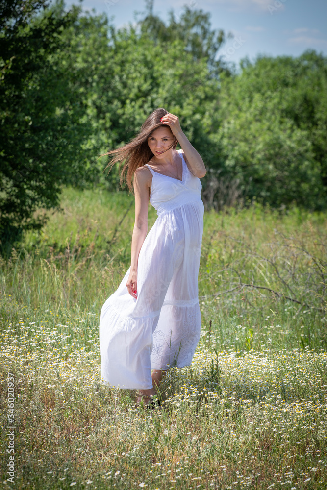Young woman in white dress Young woman in white dress