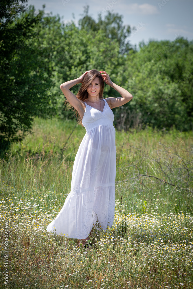 Young woman in white dress Young woman in white dress