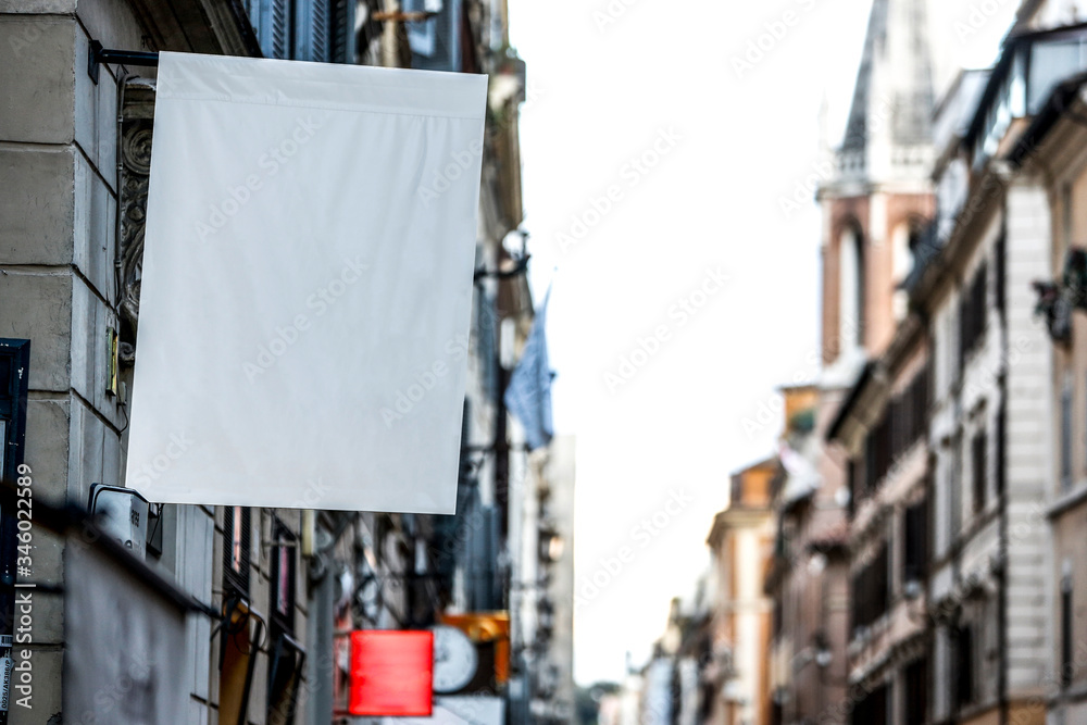 Hanging rectangular blank flag on the street in the city - Image