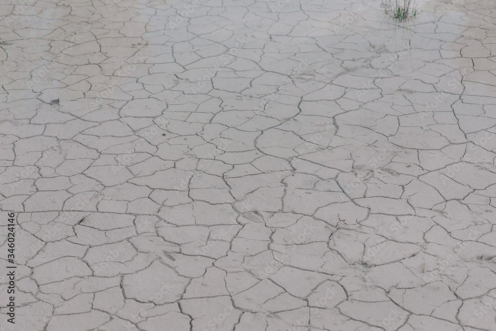 old abandoned limestone quarry flooded with water. White earth in