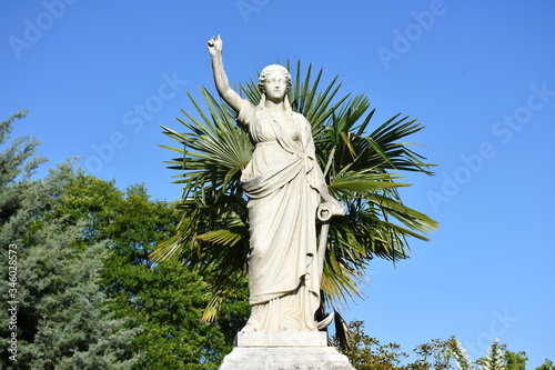 Statue of the Virgin Mary in a cemetery 