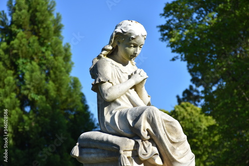 Small statue in a cemetery 