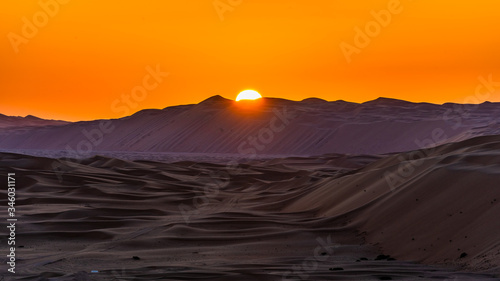 sunset in the desert liwa ,abu dhabi , united arab emirates