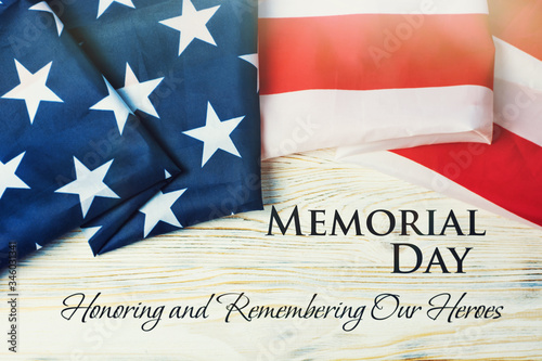 Photography American flag and a poppy flowers with Memorial Day Remember and Honor text back