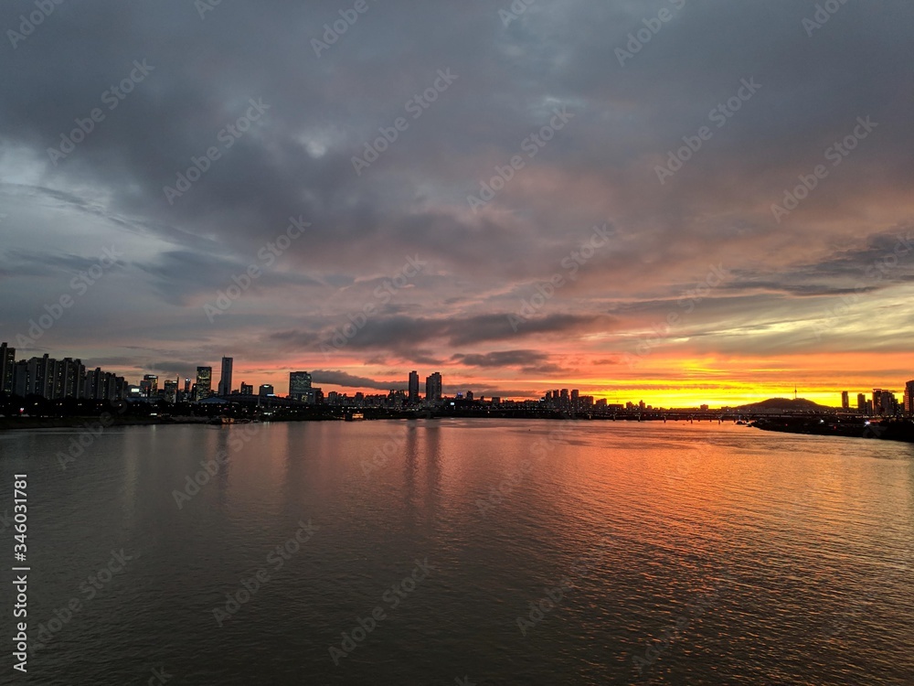 sunset over Seoul City by Han River Grey background
