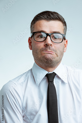 Businessman with funny discouraged face
