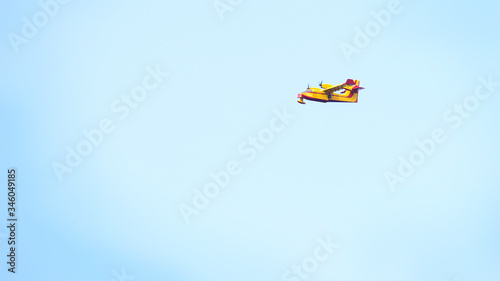 Firefighting airplane - canadair - in flight.