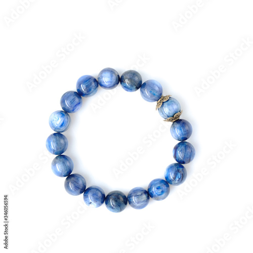 Lapis Lazuli gem or blue rock bracelet or wristband isolated on white background, accessories for the wrist.