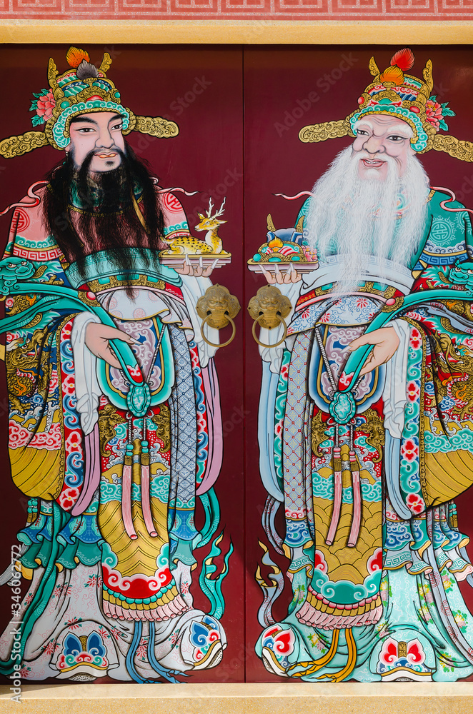Chinese Shrine Decorate with Colorful Ornament Painting as Guardian on Wood Door.