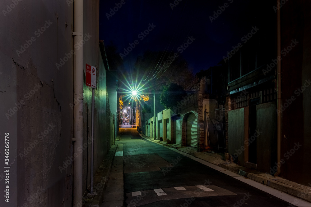 Fototapeta premium green light in ols street at night