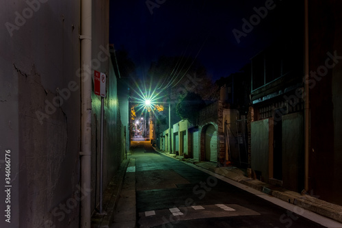 green light in ols street at night