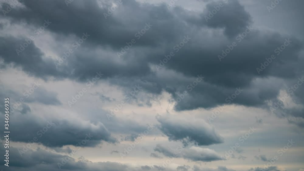 Dramatic dark storm cloudscape fast motion time lpase nature background. Dramatic dark storm cloudscape fast motion time lpase nature background.