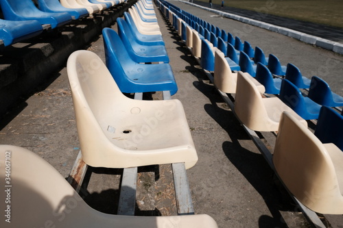 blue and white chairs outdoors stadium items a lot in summer in autumn winter in spring