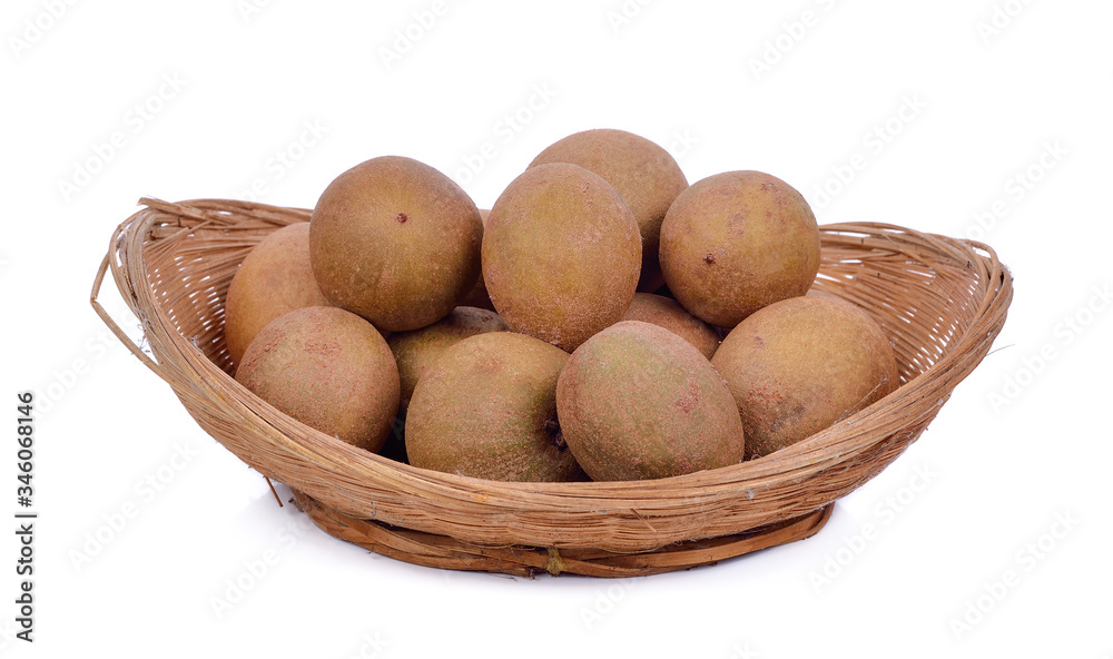fresh sapodilla fruits on white background