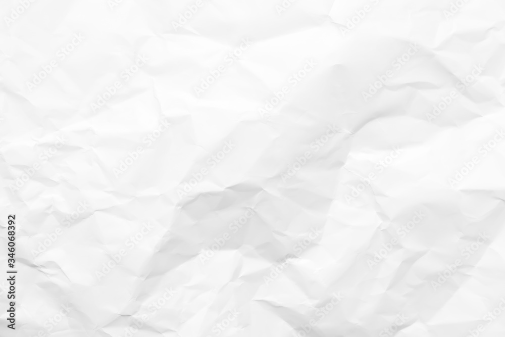 White crumpled paper texture background. Clean white paper. Top view.
White crumpled paper texture background. Clean white paper. Top view.