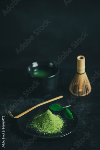 Japanese matcha tea  in bowl on black background